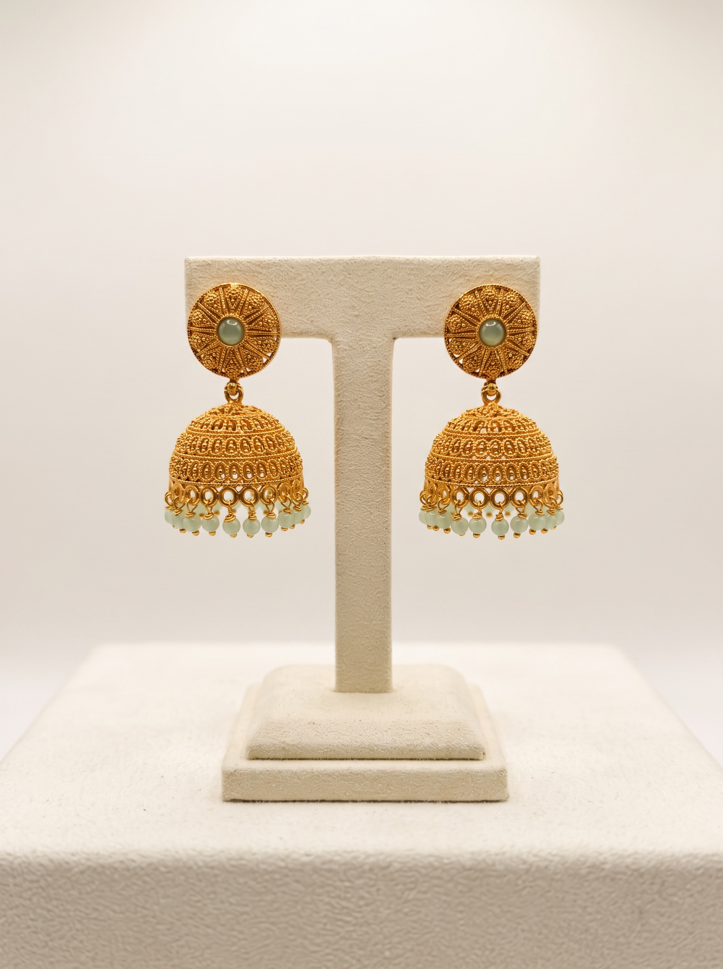 Gold Jhumka Earrings with Mint Beads