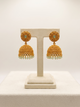 Gold Jhumka Earrings with Mint Beads