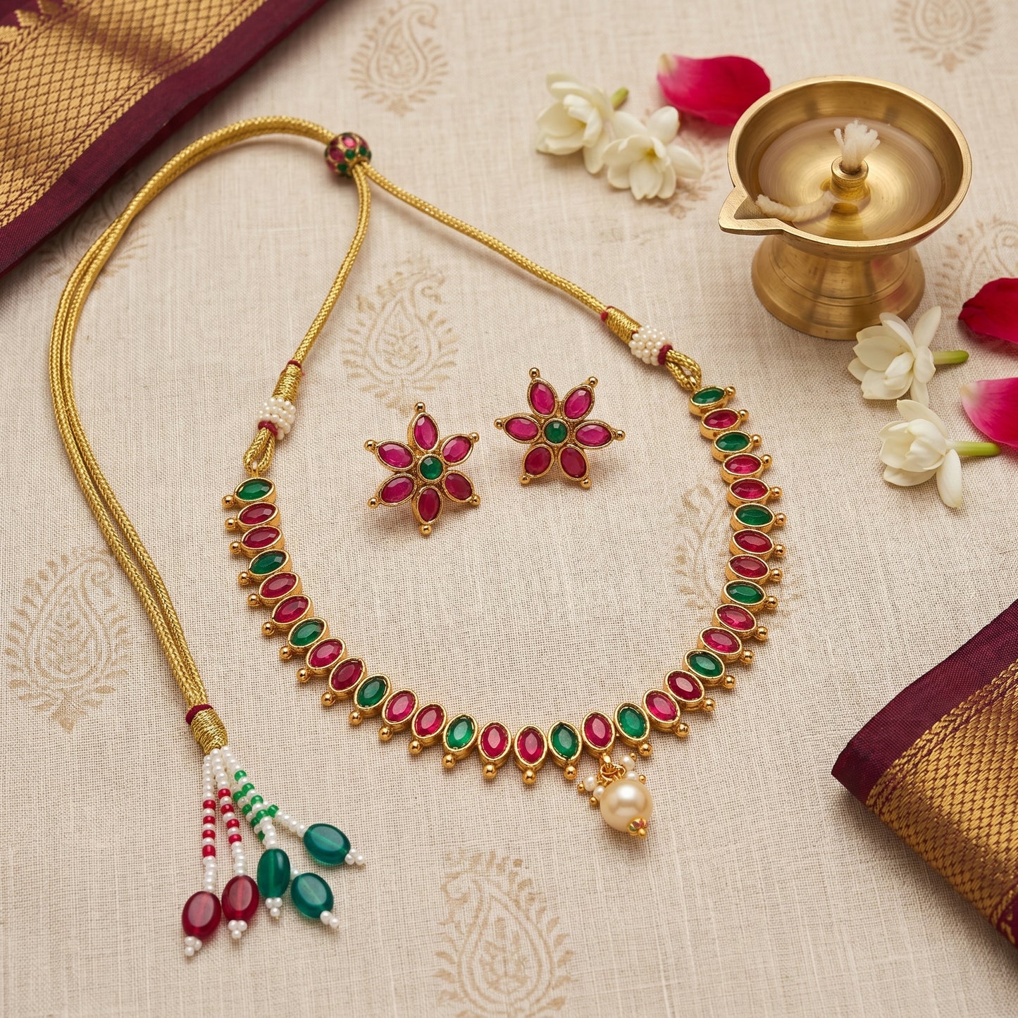Ruby Emerald Bloom Necklace Set - South Indian gold-tone floral jewellery with ruby pink and emerald green stones