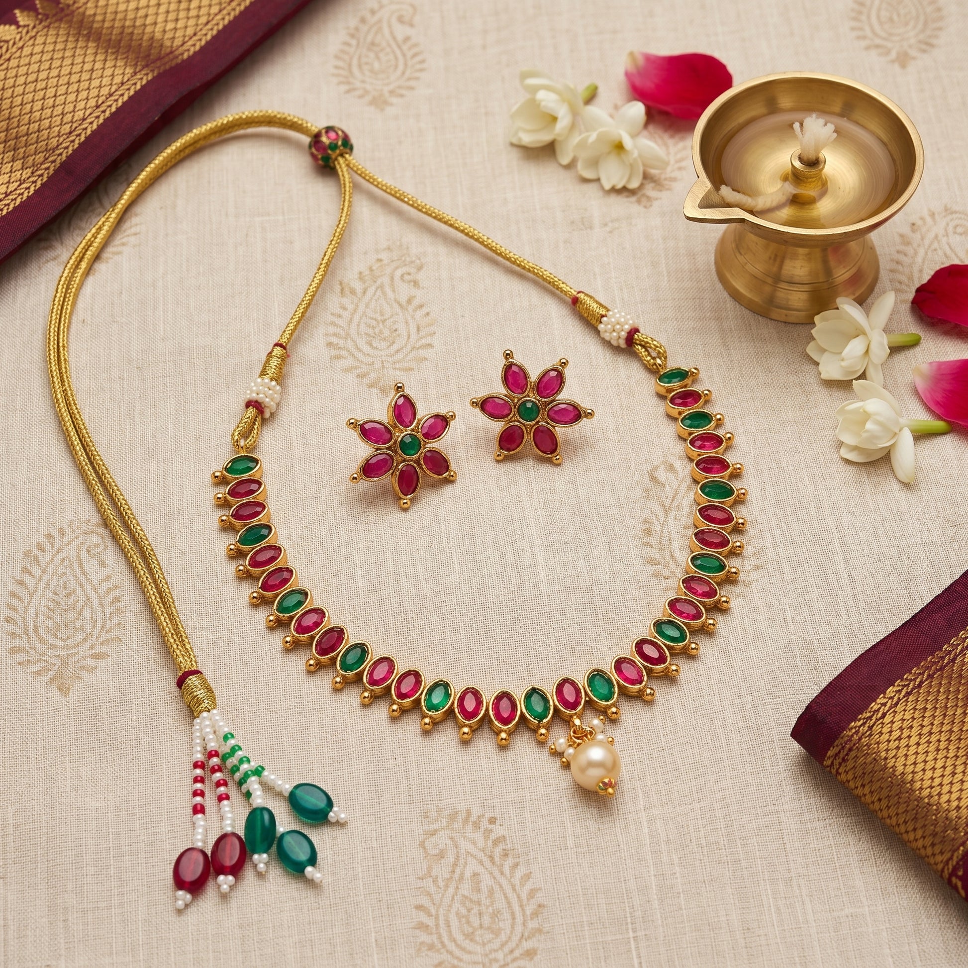 Ruby Emerald Bloom Necklace Set - South Indian gold-tone floral jewellery with ruby pink and emerald green stones